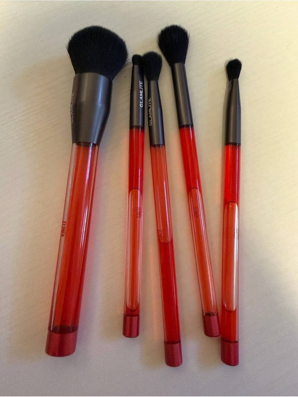 Saw x Glamlite Brushes